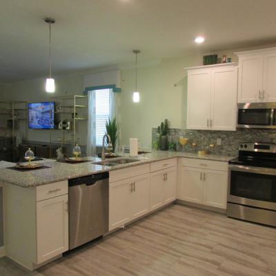 Kitchen with stainless steel appliances quartz countertop